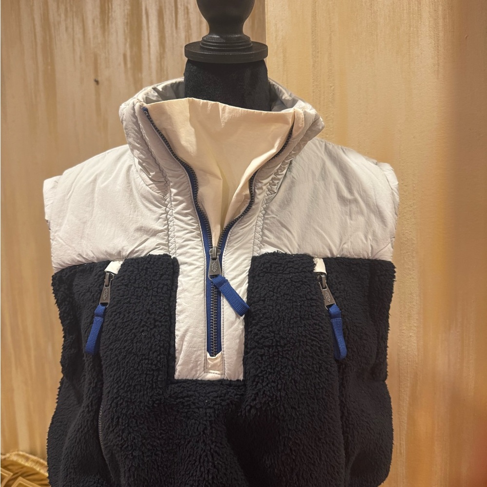 Black and White Fleece Vest with Blue Accents